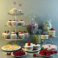 Colorful Assorted Desserts Display With Cupcakes Macarons Candies And Strawberry Toppings