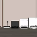 Modern Household Electrical Appliances Arranged On Wooden Floor In Interior