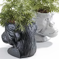 Bonsai Potted Plants in White and Black Monkey Head Shaped Planters with Green Leaves
