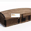 Vintage Wooden Chest With Textured Surface And Black Metal Hardware
