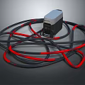 Modern Household Electrical Appliance With Coiled Black And Red Cables On Dark Surface