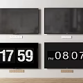 Four Modern Wall Mounted TVs Showing Two Digital Time Displays And Clear Screens