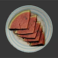 Fresh Sliced Watermelon Served on Blue and White Striped Plate