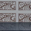 Four Elegant Swing Doors Featuring Intricate Scroll Patterns And Reflection