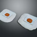 Delicious Two Freshly Baked Cookies Placed On White Paper Towels