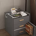 Modern Gray Bedside Table With Marble Top Drawers And Bedroom Decorative Items Next To Bed