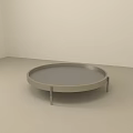 Round Metal Coffee Table With Modern Minimalist Design And Light Colored Background 3d model