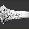 Silver Ornate Ring with Intricate Floral Patterns on Smooth Reflective Surface