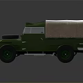 Classic Vintage Green Off Road Vehicle With Canvas Top And Front Spare Tire