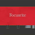 Red Focusrite Audio Interface with Control Knobs and Input Output Ports