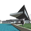 Modern Cultural Center Building With Unique Geometric Design Waterfront Lawn And Trees