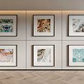 Six Framed Abstract Wall Art Pieces On Light Colored Wall With Herringbone Wood Floor