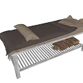 Comfortable Massage Bed With Dark Mat and Pillows Underbed Striped Rack and Brown Towels
