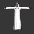 A Man In Traditional White Robe And Headscarf Standing With Arms Outstretched Against Gray Background