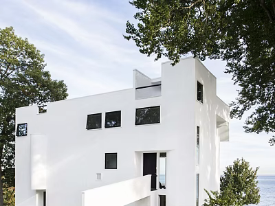 White Modern Vacation Rental Building Surrounded by Trees With Ocean View and Sky 3d model