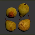 Fresh Ripe Juicy Yellow Red Speckled Pears on Dark Reflective Surface