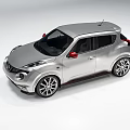 Silver Compact Sports Car Featuring Sporty Design Red Accents And Alloy Wheels
