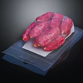 Fresh Red Sausages Packaged In Transparent Plastic Bag On Black Background