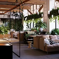 Open Restaurant Interior With Lush Greenery Natural Light Cozy Seating And Wooden Dining Tables
