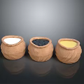 Three Handmade Clay Pots With White Black And Yellow Contents For Home Use