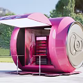 Outdoor Pink Can Shaped Kiosk With Display Shelves And Green Surroundings