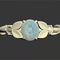 Elegant Golden Ring With Twisted Band Leaf Details And Blue Gemstone