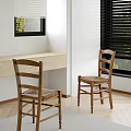 Wooden Ladder Back Dining Chairs With Woven Seats In Bright Interior With Window