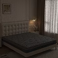 Gray Perforated Mattress On Bed Frame With White Tufted Headboard In Modern Bedroom