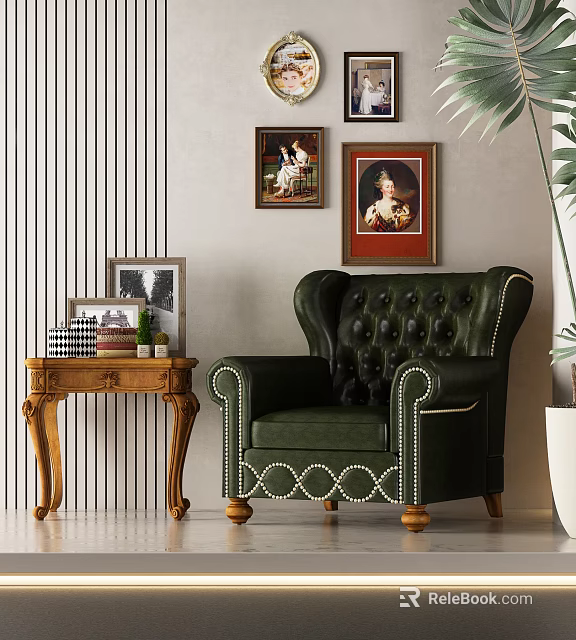 Green Leather Tufted Single Sofa With Wooden Legs Side Table Photo Frames Wall Art 3d model 