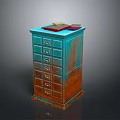 Rustic Blue And Brown Chest Of Drawers With Books On Top And Metal Handles