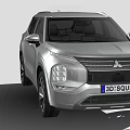 Silver Mitsubishi SUV With Modern Front Headlights Sleek Body Lines And Alloy Wheels
