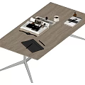 Modern Coffee Table Featuring Wooden Top Metal Legs Magazines Notebook Pen And Mug