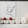 Modern White Multi Person Sofa With Red Cushions And Line Art Painting