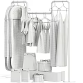 Minimalist White Clothes Hanging On Racks With Shirts Dresses And Storage Boxes