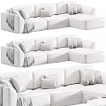 Cozy Light Colored L Shaped Sofa With Soft Cushions And Warm Blanket