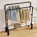 Black Metal Clothing Rack with Hanging Clothes Storage Boxes and Fruit Basket for Home Organization