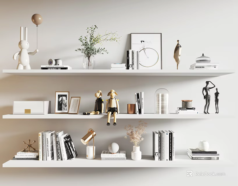 Stylish Decorative Ornament Set On White Shelves With Rabbit Figurine Vase Photo Frames And Books 3d model 