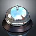 Shiny Chrome Service Bell With Polished Metal Surface And Round Base