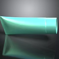 Green Cosmetic Tube With Smooth Surface And Reflection On Black Background