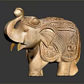 Handcrafted Wooden Elephant Figurine With Intricate Carved Patterns And Details