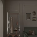 Green Two Seater Sofa With Coat Hanger Clothes Pink Bag Decorative Paintings And Flowers