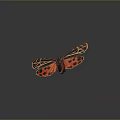 Orange And Black Butterfly With Spotted Striped Wings On Dark Background