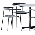 Modern Dining Table and Chairs Set with Minimalist Black Metal Frame and Round Table Top