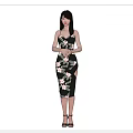 Elegant Woman Wearing Black Floral Dress with Slit Design and High Heels
