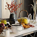 Elegant Dining Table Setting With Wine Bottles Wine Glasses Tea Pot Fruits And Bread