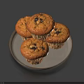 Four Fresh Baked Muffins on Silver Plate with Dark Dried Fruits on Deep Blue Background