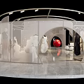 Modern Clothing Store Interior With Curved Design Transparent Partitions And Mannequins