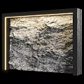 Rough Textured Accent Wall with Black Frame Illuminated by Warm LED Strip