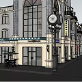 Charming Commercial Street With Storefronts Awnings Outdoor Seating And Street Lamps