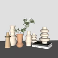 Decorative Vases With Greenery Various Shapes Neutral Tones Arranged With Stack Of Books